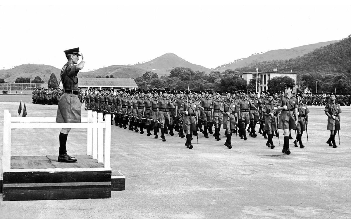 Lt Col RNP Reynokds MBE takes the salute from A Company led by Cpat RW Shoesmith at the Amalgmation parade in Hong Kong 1969