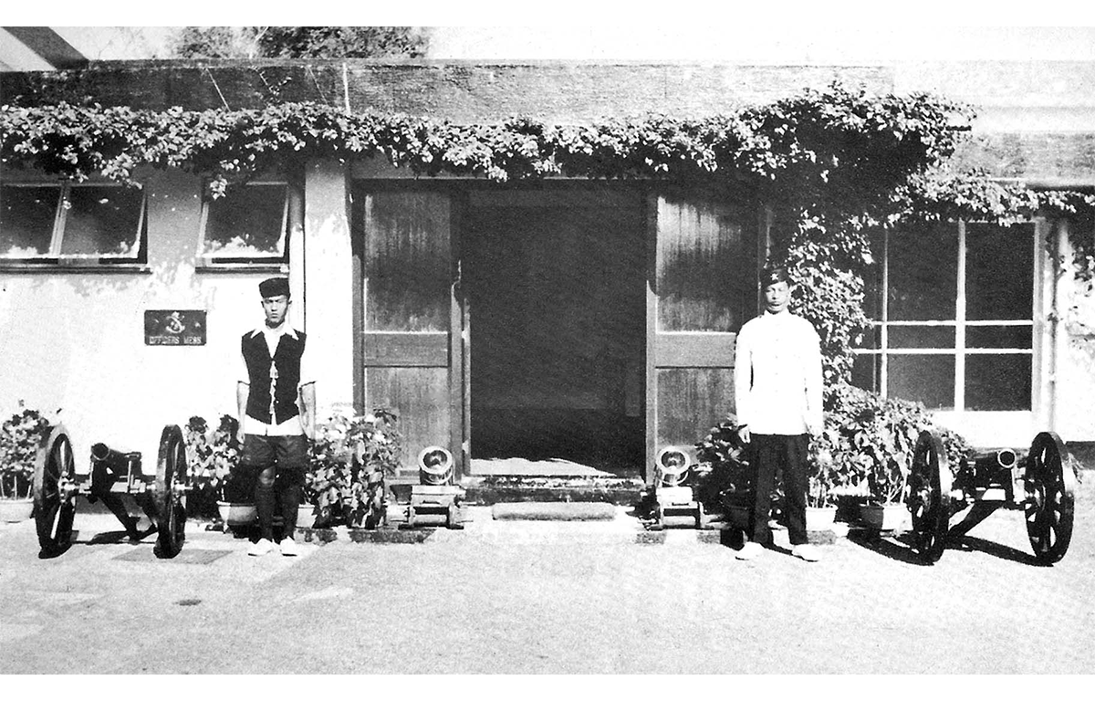 Orderlies in Summer day and night uniforms alongside bubble and Squeak Kas mortars Officer Mess Cassino Lines Hong Kong 1976